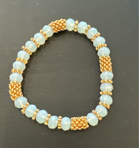 ALD light blue stone w gold beads stretch bracelet