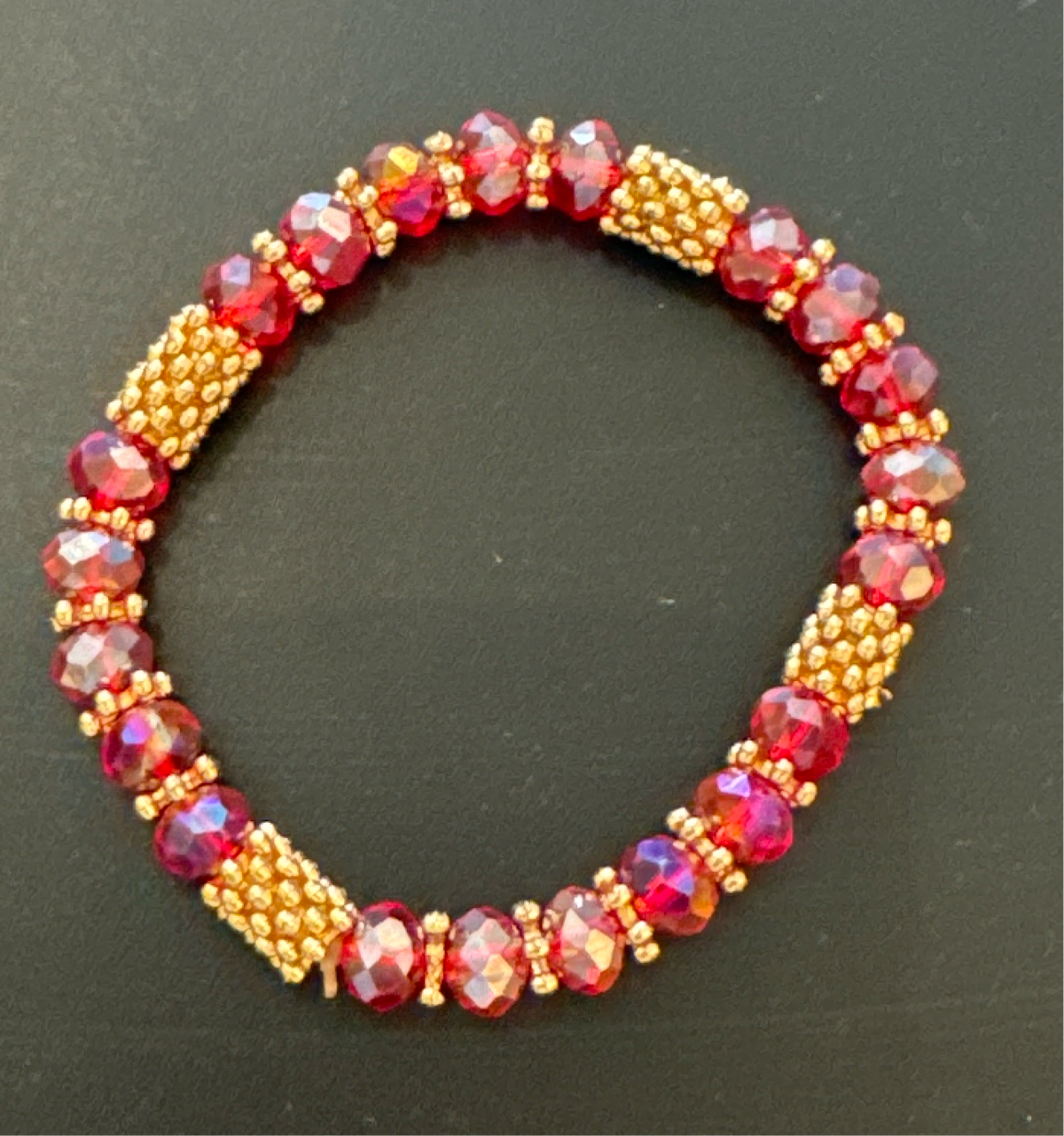 ALD red stone w gold bead stretch bracelet