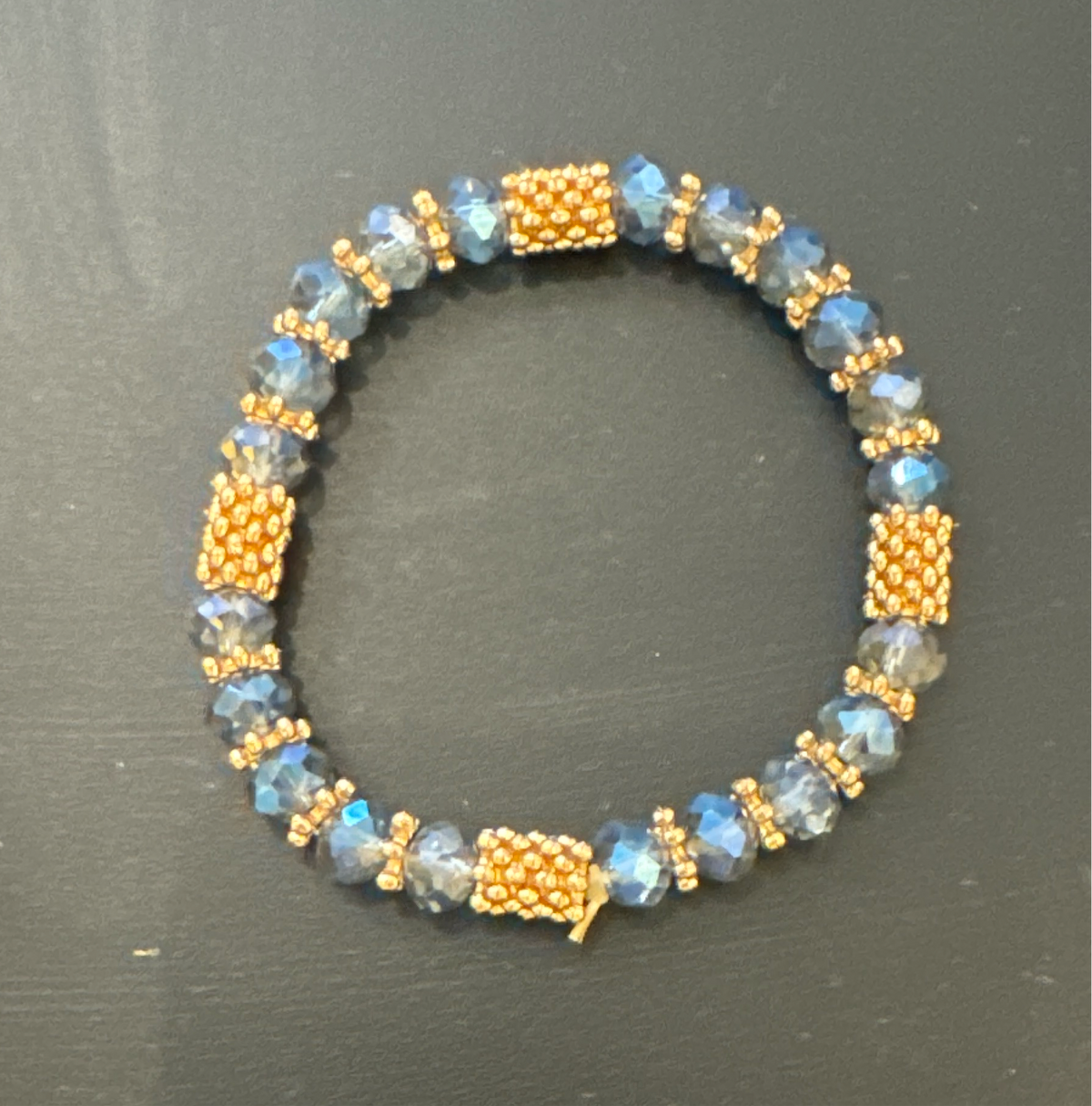 ALD dark blue stone w gold bead stretch bracelet