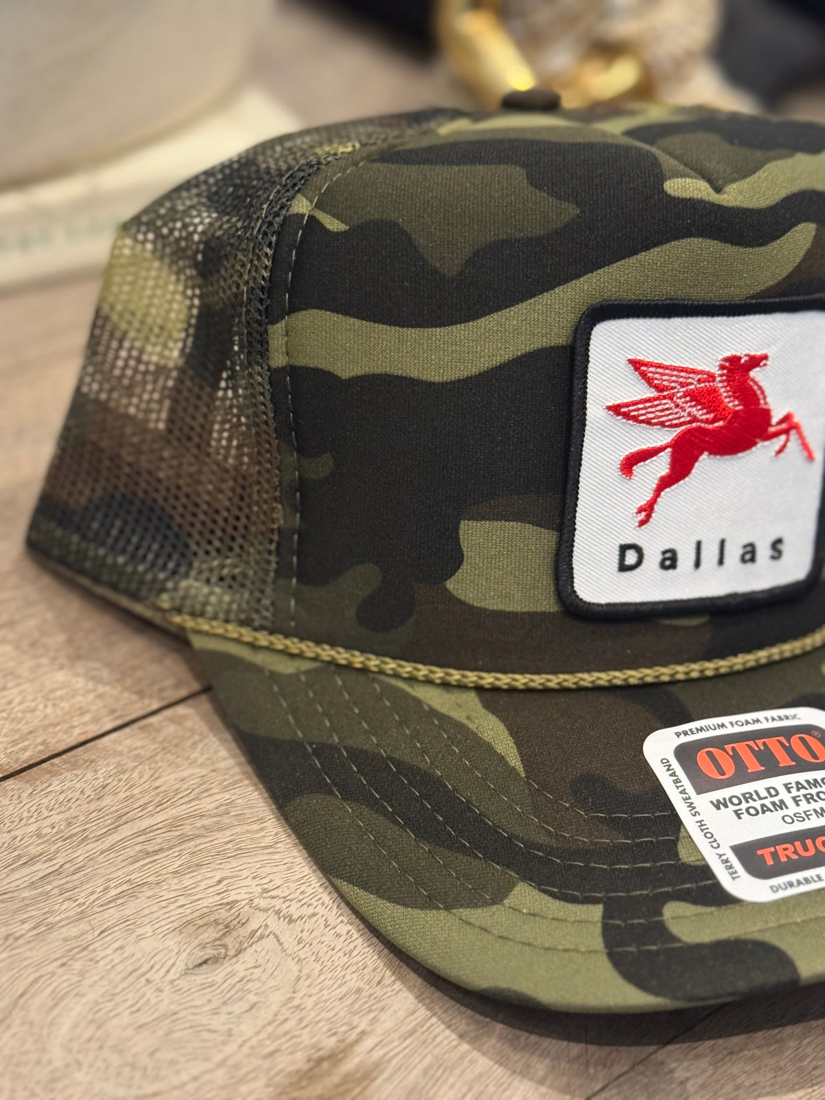 Dallas hat in full camo with pegasus patch on front